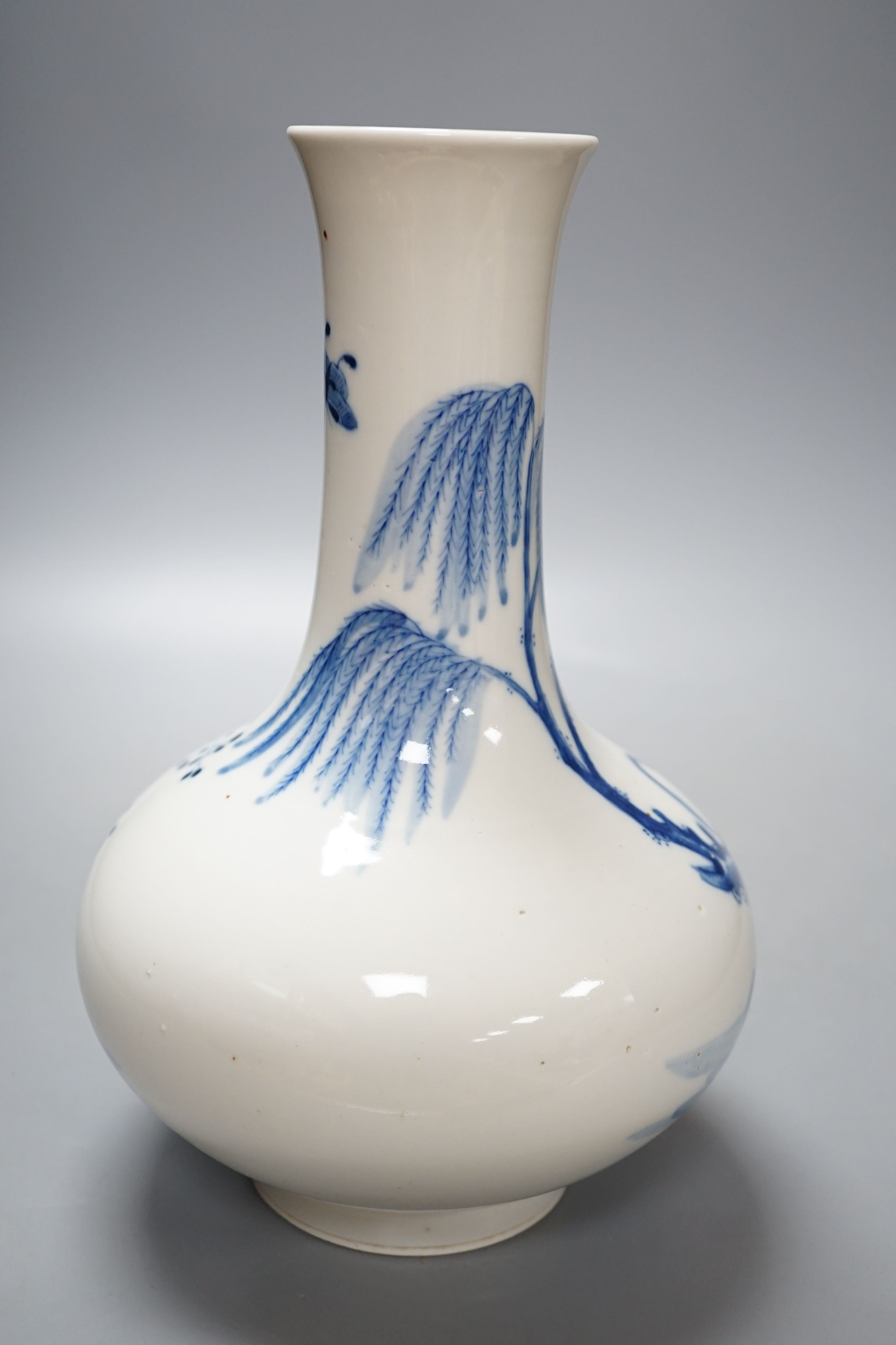 A Chinese blue and white glazed porcelain bottle vase - 27cm tall